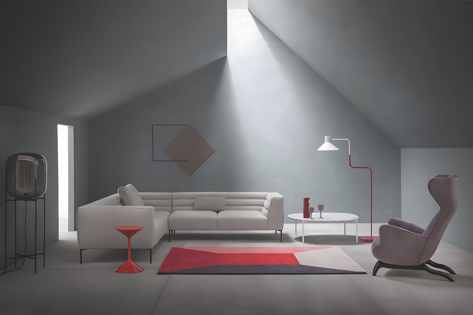 Zona living con divano angolare e luce zenitale